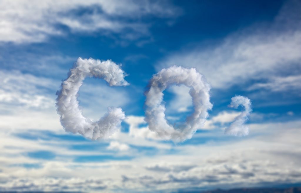 Cloud CO2 symbol on blue sky background. Planet pollution, smog concept. 3d illustration